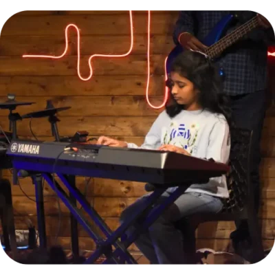 child playing musical keyboard