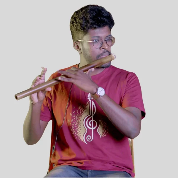 Flute expert holding flute